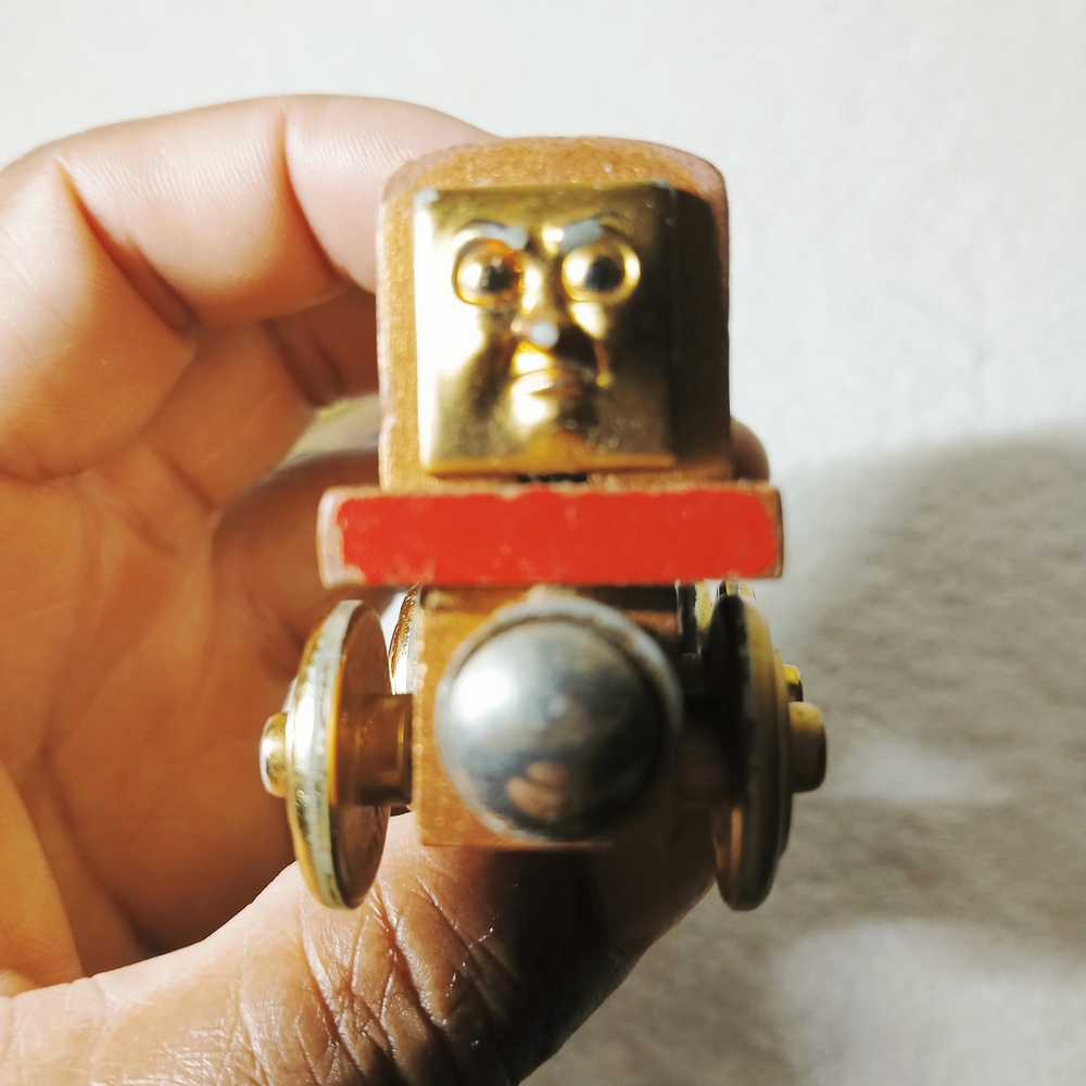 Wooden Train Engine Toy with Gold and Red Accents